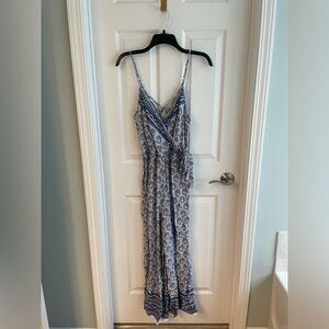 Japna blue and white floral wide-leg jumpsuit with contrast trim and side ties